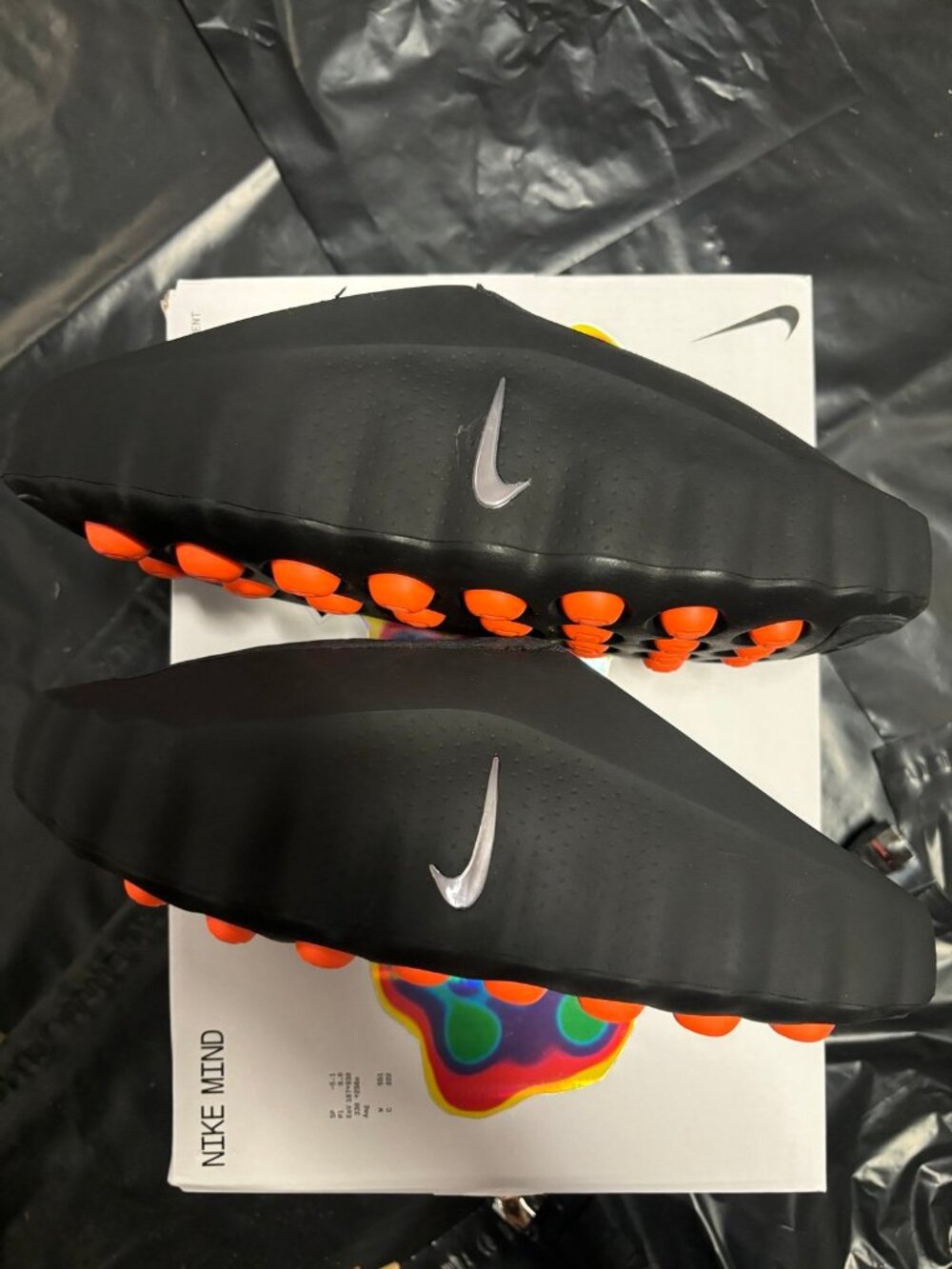 Nike Men’s Black Slip-On Athletic Shoes with Orange Traction Pods